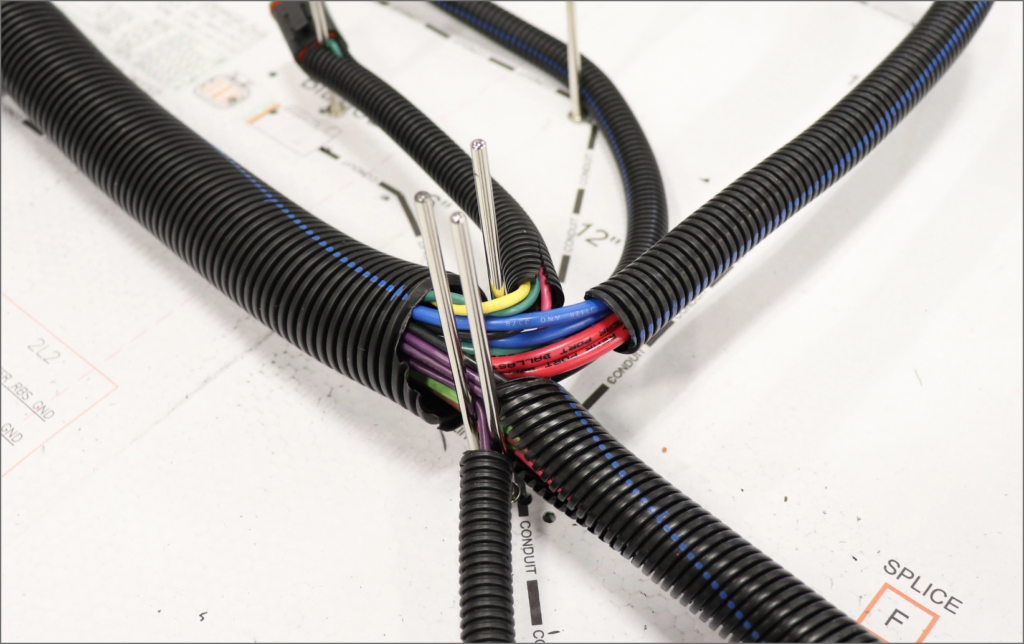 Performance Optimization: Wire Routing of Harness Assemblies